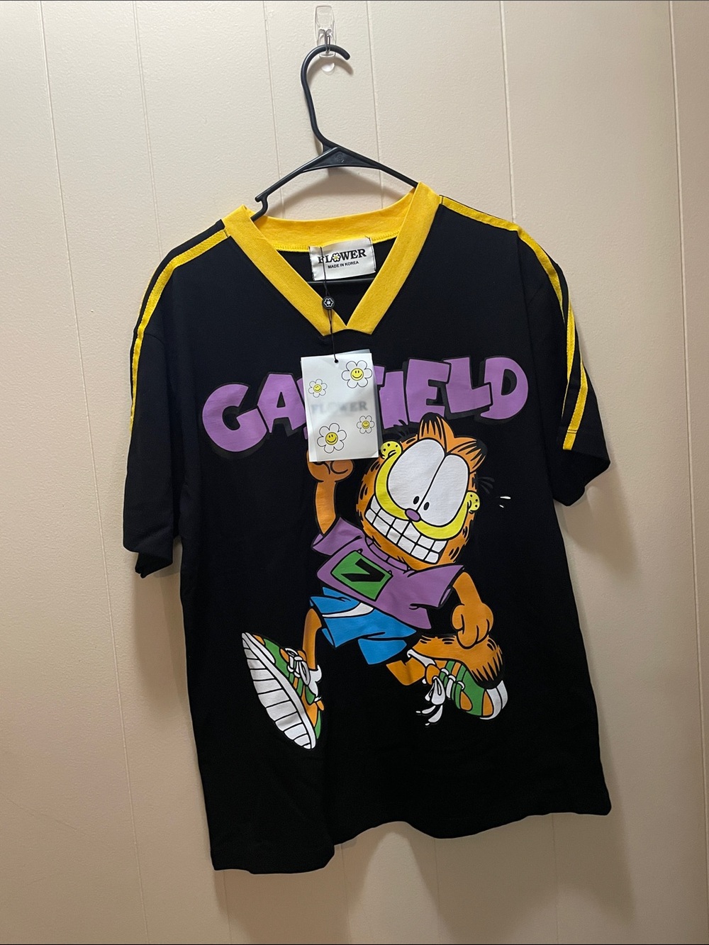Garfield Graphic V-Neck Tee in Black and Yellow - Flower Brand from Thailand